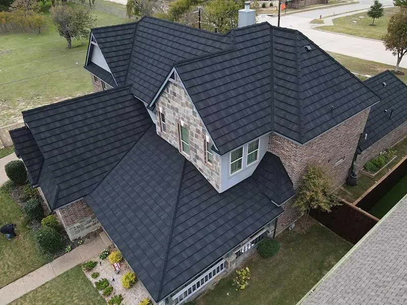 Example home with a dark stone-coated steel roof